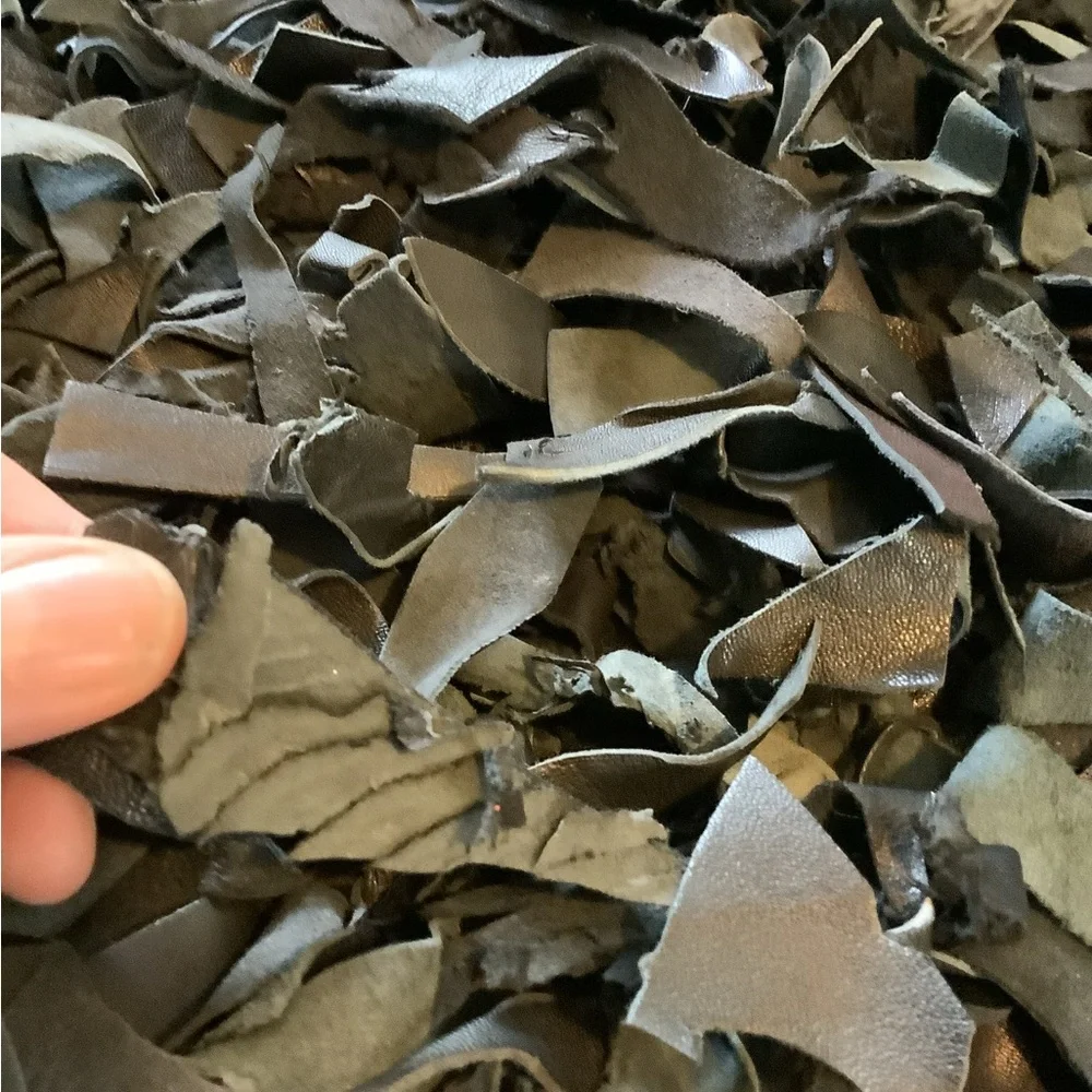 Leather scraps rug 20” by 37 1/2”